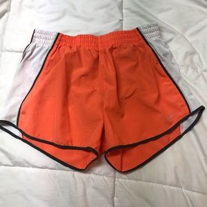 orange nike shorts